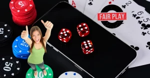 Concept of Online Casino - Dice - Cards - Mobile Phone - Happy Woman Giving Thumbs Up